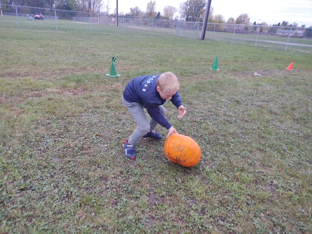 Today was the start of our fun fall activities in PE . Students competed in pumpkin rolling relay races! 